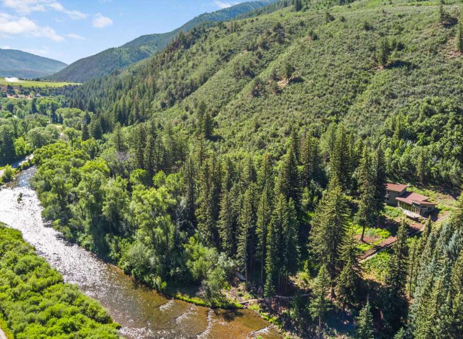 Nestled amidst a lush forest, this stunning property offers unparalleled tranquility and natural beauty.