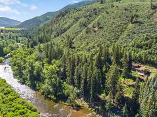 Nestled amidst a lush forest, this stunning property offers unparalleled tranquility and natural beauty.