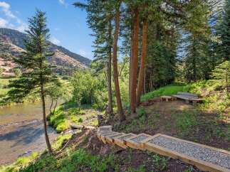 Discover your private riverside retreat with this stunning property.