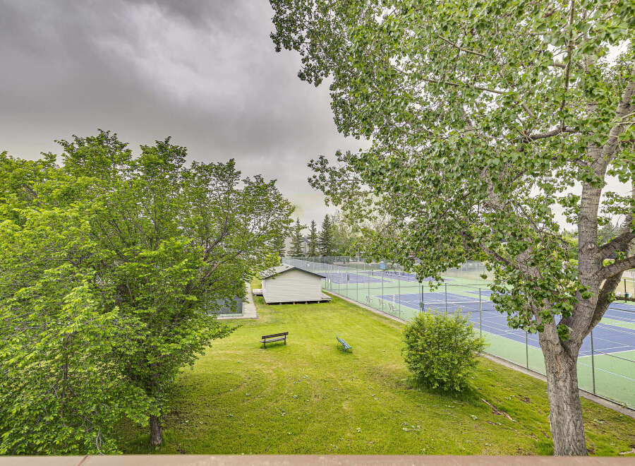 Enjoy outdoor recreation with this property featuring multiple tennis courts, perfect for enthusiasts of all levels.