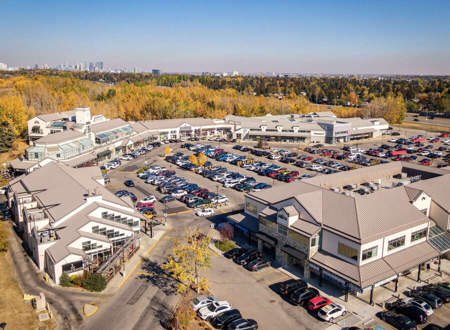 Discover this vibrant commercial property featuring a mix of retail and office spaces, ideal for businesses seeking a prime location.