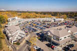 Discover this vibrant commercial property featuring a mix of retail and office spaces, ideal for businesses seeking a prime location.
