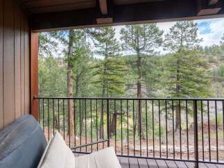 Enjoy breathtaking mountain views from this charming balcony, perfect for your morning coffee or evening relaxation.