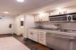 This charming studio apartment features a compact yet fully equipped kitchenette, perfect for preparing meals during your stay.