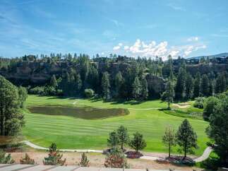 Experience luxury living with this stunning golf course view property, featuring a serene pond and meticulously manicured fairways.