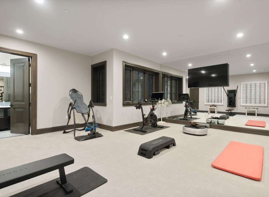 Transform your home into a personal fitness sanctuary with this fully equipped gym.