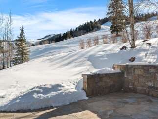 Experience the ultimate mountain lifestyle with this stunning property offering breathtaking views of snow-covered slopes and pristine wilderness.