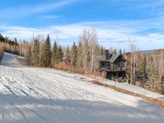 Experience luxury mountain living in this stunning ski-in/ski-out property.