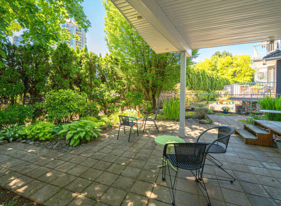 Enjoy outdoor living on this spacious patio, perfect for entertaining or relaxing.