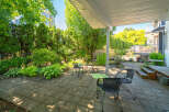 Enjoy outdoor living on this spacious patio, perfect for entertaining or relaxing.