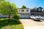 Discover this charming home featuring a spacious driveway leading to a double garage, perfect for multiple vehicles.