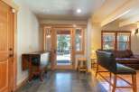 Step into this inviting entryway featuring a convenient drop-leaf table perfect for quick meals or extra workspace.