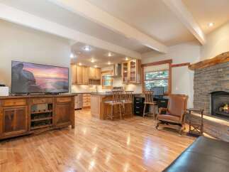 Experience the perfect blend of rustic charm and modern convenience in this open-concept living space.