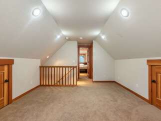 Discover this charming attic space, perfect for a cozy bedroom or versatile living area.