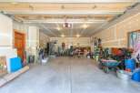 This spacious garage offers ample storage and workspace, perfect for any homeowner's needs.