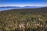 Discover your dream mountain retreat nestled within a dense pine forest, offering unparalleled privacy and tranquility.