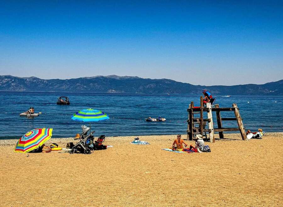 Enjoy a perfect summer day at this stunning lakeside property, featuring a sandy beach and crystal-clear waters ideal for swimming and water sports.