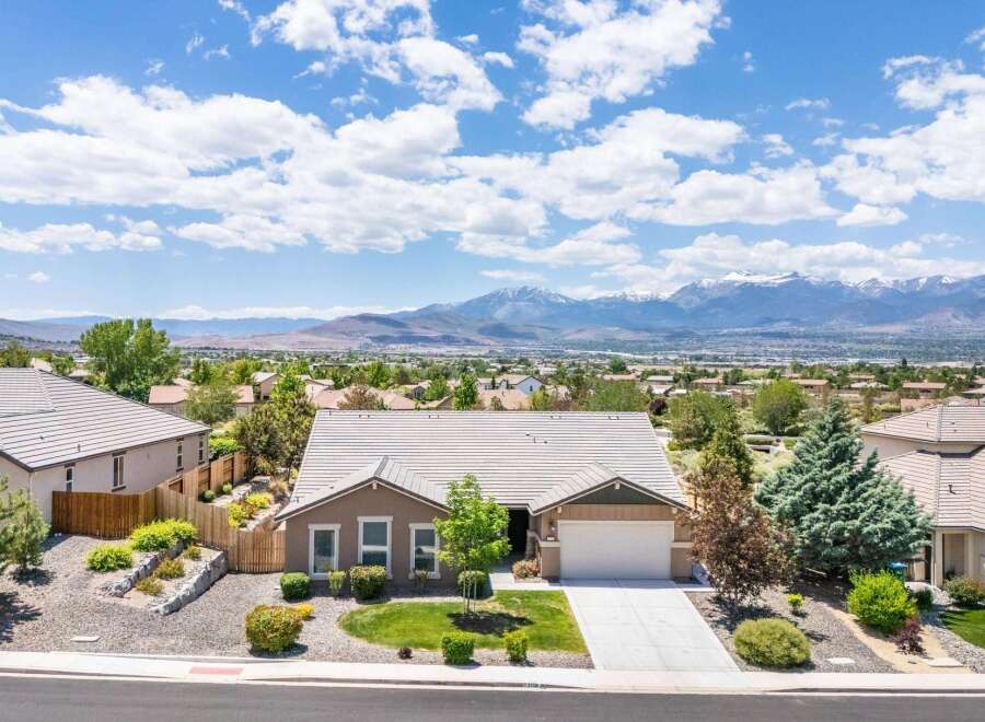 Discover this stunning single-story home offering breathtaking mountain views and a serene desert landscape.