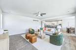 Experience modern living in this spacious open-concept home, featuring a bright living area perfect for gatherings and a sleek, contemporary kitchen with ample counter space.