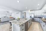 Experience modern living in this spacious open-concept kitchen and living area.