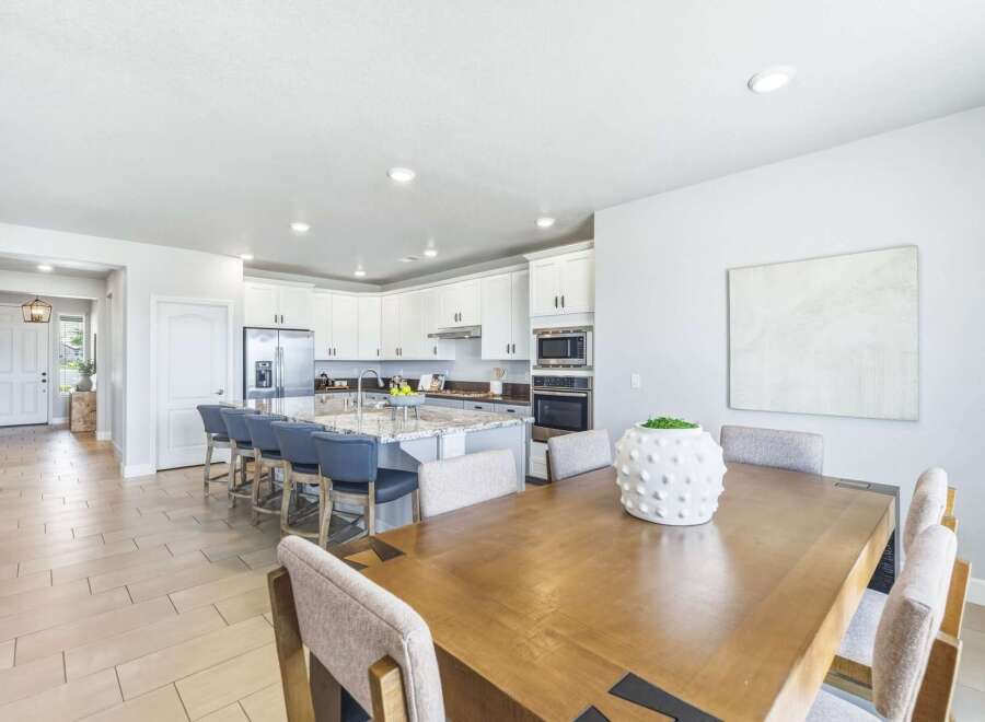 This spacious open-concept home features a gourmet kitchen with a large island, perfect for entertaining.