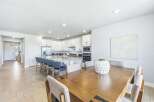 This spacious open-concept home features a gourmet kitchen with a large island, perfect for entertaining.