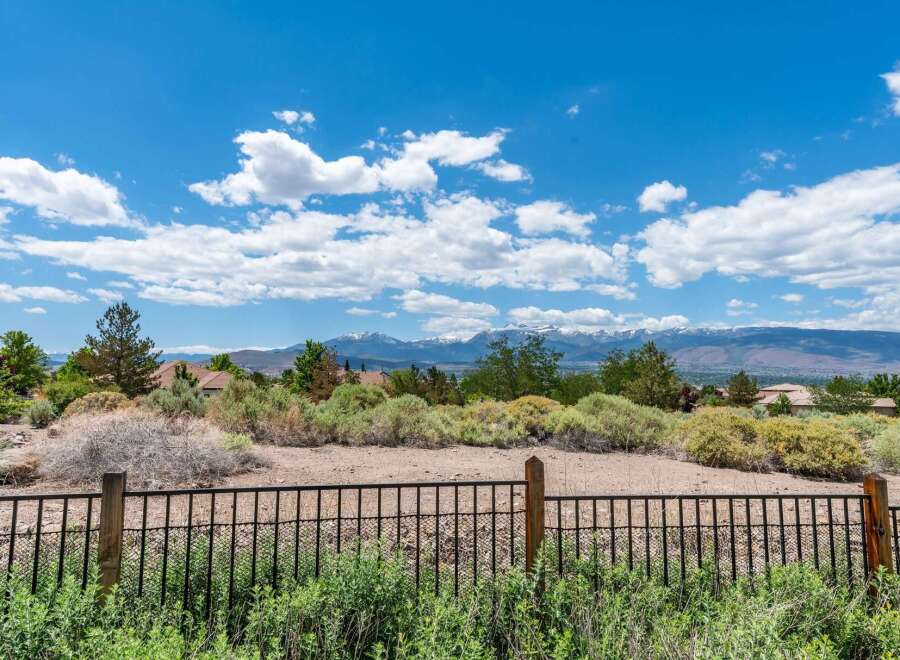 Experience breathtaking mountain views from this stunning property, perfect for building your dream home.