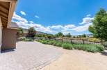 Enjoy outdoor living with this expansive paver patio, perfect for entertaining or relaxing.
