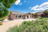 Discover this charming home with a spacious patio, perfect for outdoor entertaining and enjoying the serene mountain views.