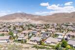 Discover this stunning suburban neighborhood nestled against a backdrop of majestic mountains.