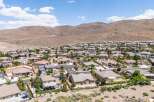 Discover this stunning suburban neighborhood nestled against rolling hills, offering a serene escape with beautiful homes and lush landscaping.