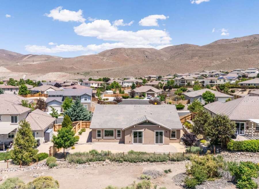 Discover this stunning single-story home featuring a spacious backyard patio perfect for outdoor entertaining.