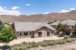 Discover this stunning home featuring a spacious patio perfect for outdoor entertaining, overlooking a serene backyard.