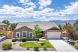 Discover this charming single-story home featuring a spacious living area and a well-maintained front yard.
