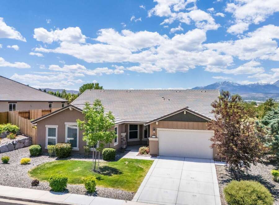 Discover this charming single-story home featuring a spacious 3-car garage and a beautifully landscaped front yard with mature trees.