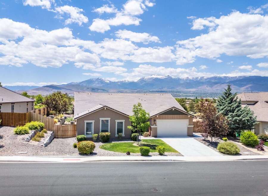 Discover this stunning single-story home with breathtaking mountain views, perfect for those seeking tranquility and natural beauty.