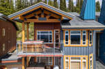 Experience luxury mountain living with this stunning property featuring a private hot tub on the deck, perfect for soaking in the breathtaking views.
