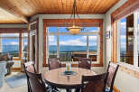 Enjoy breathtaking mountain views from this charming dining area, perfect for intimate meals or entertaining guests.