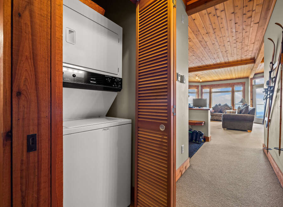 Discover convenient living with this stacked washer and dryer unit, perfect for maximizing space.