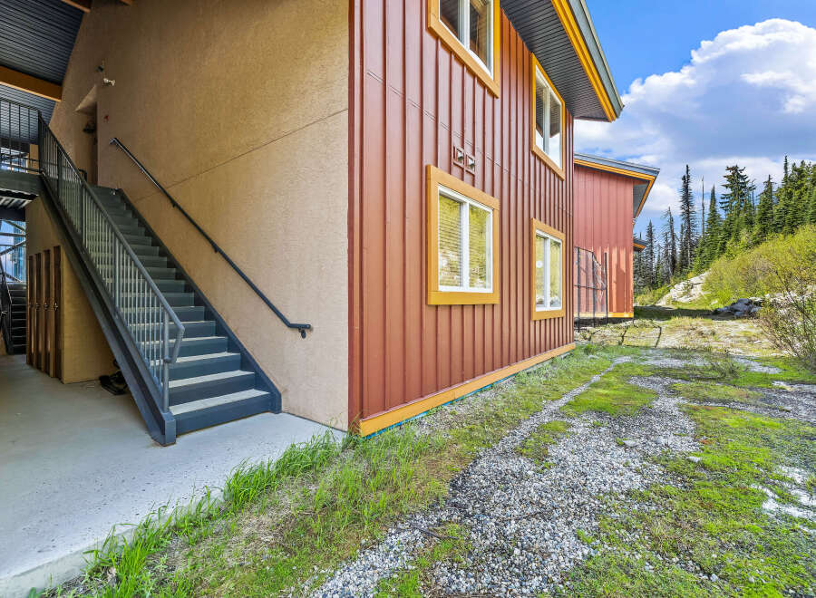Discover this charming property featuring a durable metal exterior and a welcoming stucco finish.