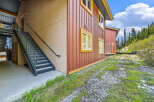 Discover this charming property featuring a durable metal exterior and a welcoming stucco finish.