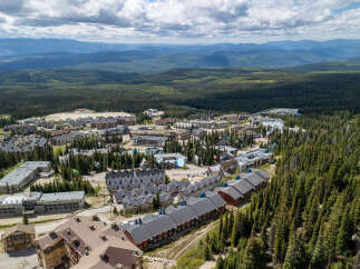 Discover this stunning mountain village offering a unique blend of modern architecture and natural beauty.