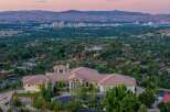 Experience luxury living with this stunning estate offering panoramic city and mountain views.