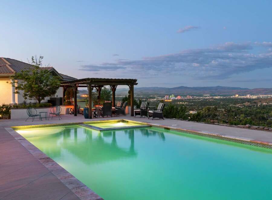 Experience luxury living with this stunning property featuring a sparkling swimming pool and an integrated spa, perfect for relaxation and entertainment.