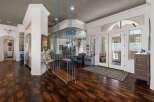 Step into this stunning home featuring a unique indoor swing, perfect for adding a playful touch to your living space.