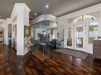 Step into this stunning home featuring a unique indoor swing, perfect for adding a playful touch to your living space.