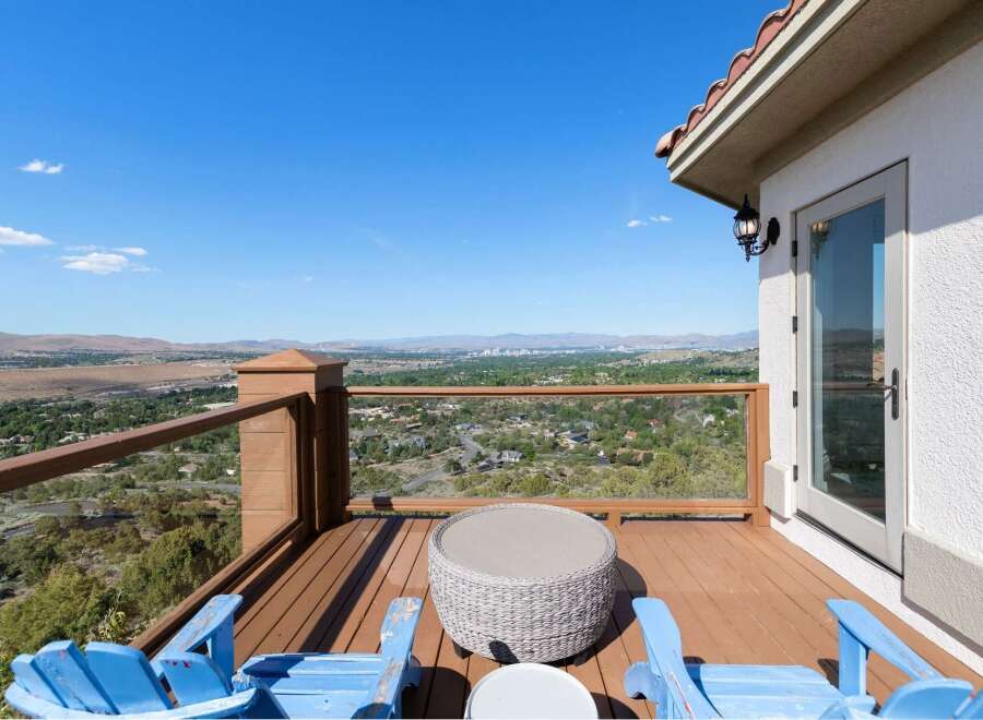 Enjoy breathtaking panoramic views from this stunning deck, perfect for entertaining or quiet relaxation.