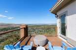 Enjoy breathtaking panoramic views from this stunning deck, perfect for entertaining or quiet relaxation.