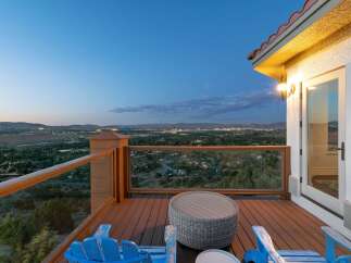 Enjoy breathtaking panoramic views from this stunning deck, perfect for evening relaxation.