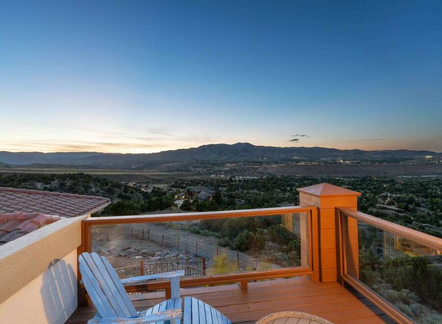 Enjoy breathtaking panoramic views from this stunning deck, perfect for unwinding or entertaining.